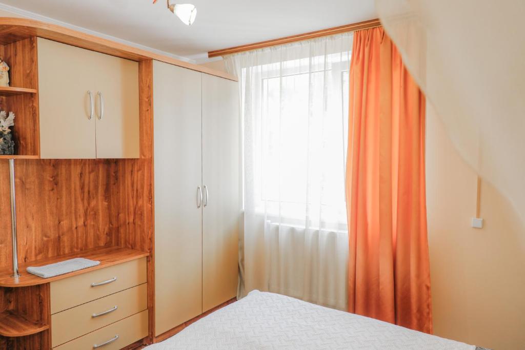 Postel nebo postele na pokoji v ubytování Фенікс