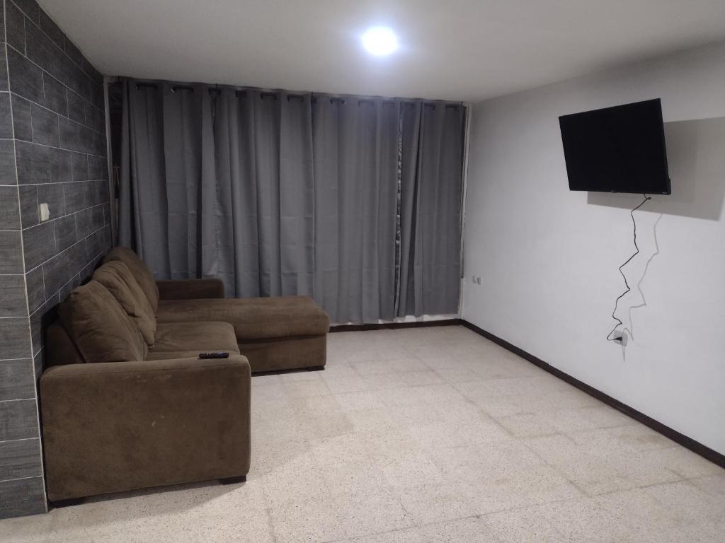 TV a/nebo společenská místnost v ubytování Amplia Casa centro de Teziutlán