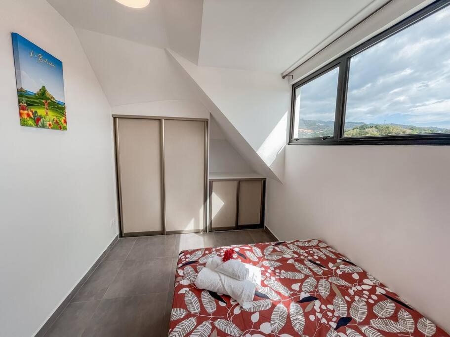 Ένα ή περισσότερα κρεβάτια σε δωμάτιο στο KOOKA NUI LODGE - Free Wifi & Parking