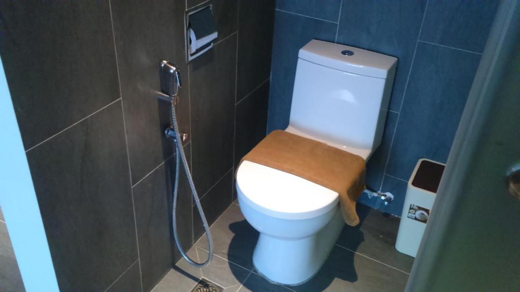 Koupelna v ubytování T+ Hotel Butterworth