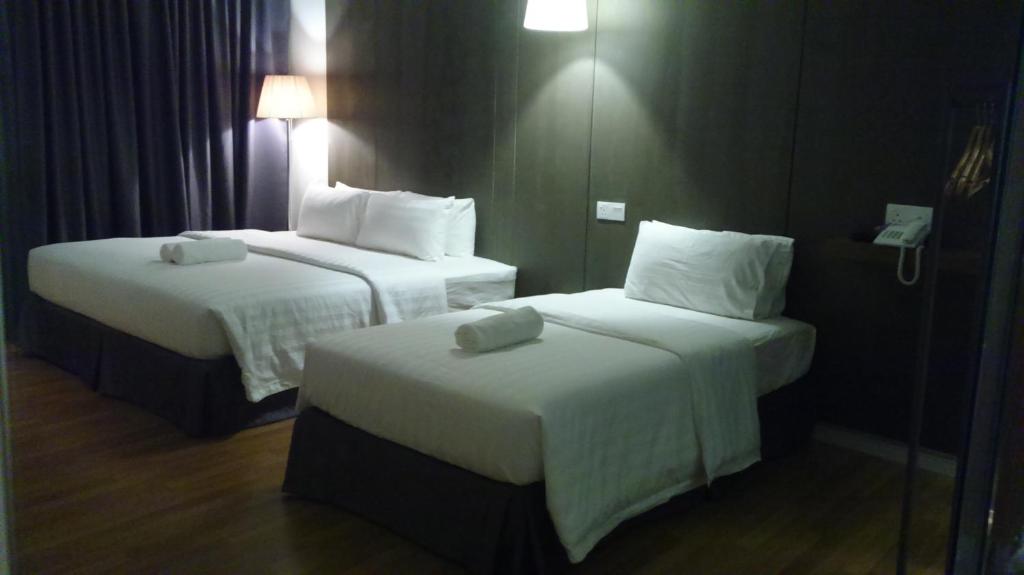 Postel nebo postele na pokoji v ubytování T+ Hotel Butterworth