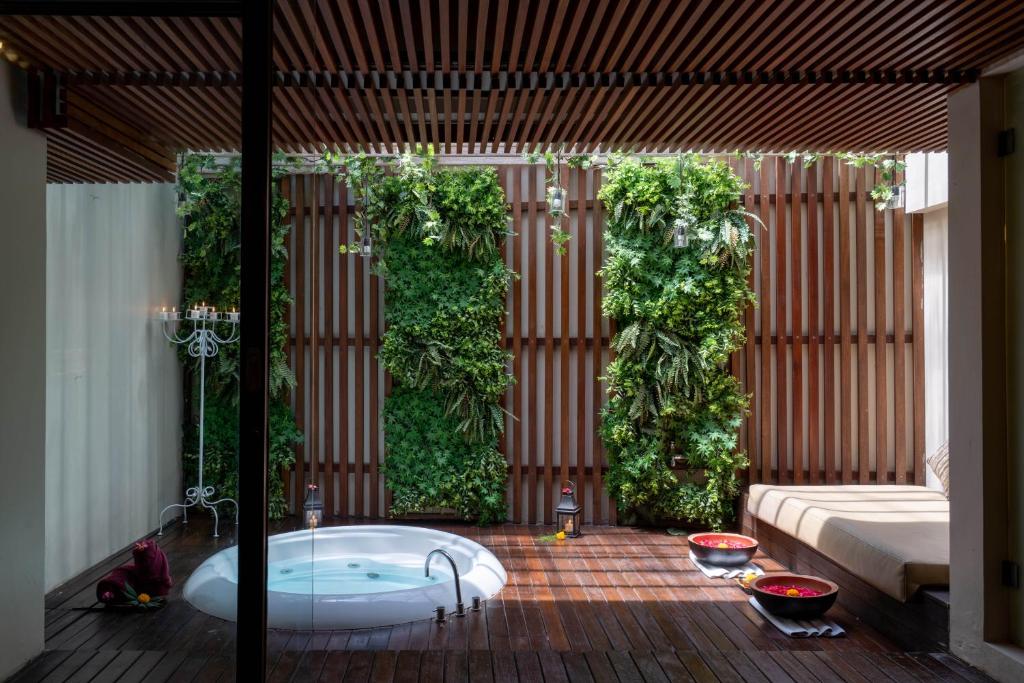 Postel nebo postele na pokoji v ubytování Berry Amour Romantic Villas