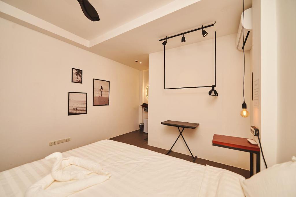 Postel nebo postele na pokoji v ubytování Hotel Gray in Boracay