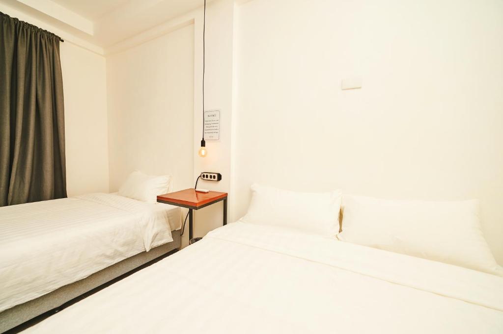 Postel nebo postele na pokoji v ubytování Hotel Gray in Boracay