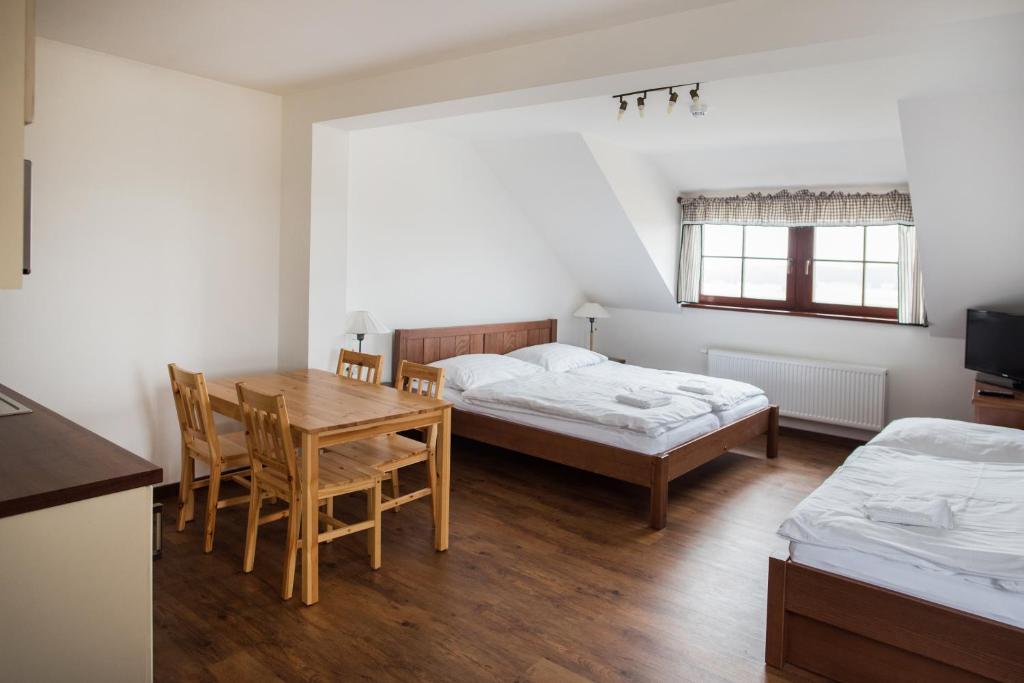 Cama o camas de una habitación en Apartmány Chajdovka