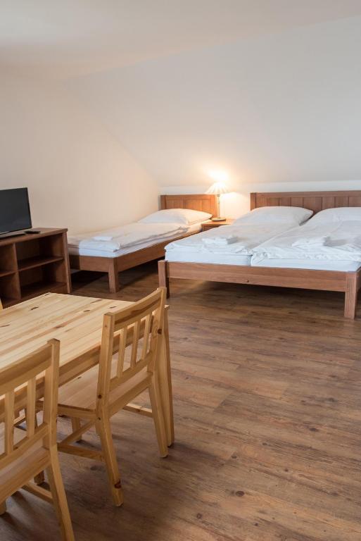 Cama o camas de una habitación en Apartmány Chajdovka