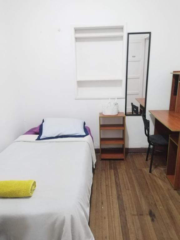 Postel nebo postele na pokoji v ubytování Casa en Bogotá ubicada en zona central