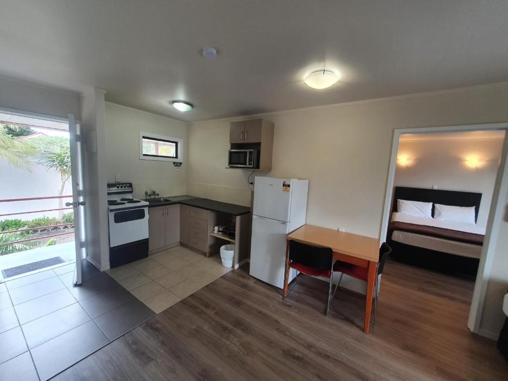 Kuchyň nebo kuchyňský kout v ubytování Ascot Epsom Motel
