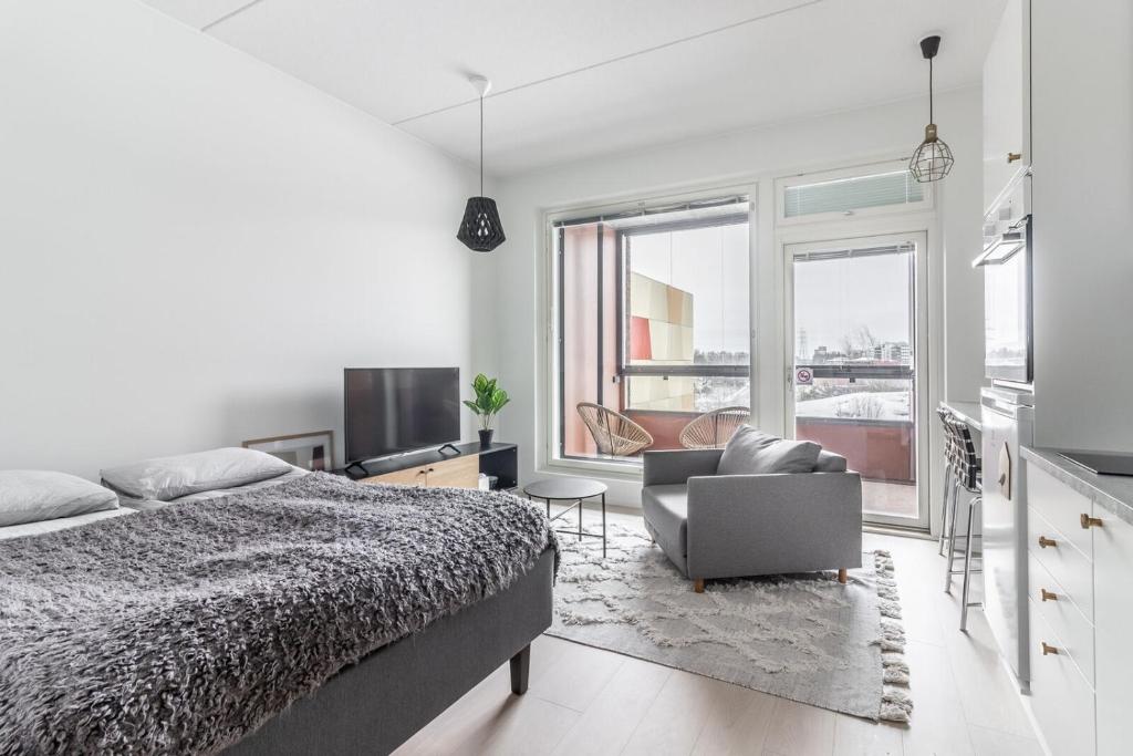 Posezení v ubytování Scandinavian apartment for 3 in Pasila Helsinki