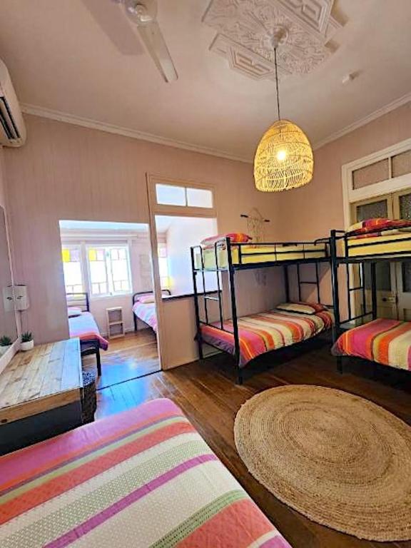 Postel nebo postele na pokoji v ubytování Dreamtime Hostel