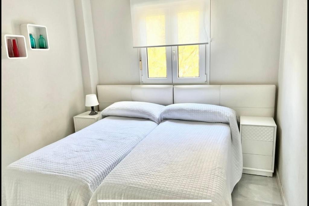 Posteľ alebo postele v izbe v ubytovaní MARBELLA - ALICATE BEACHFRONT Apartment-9