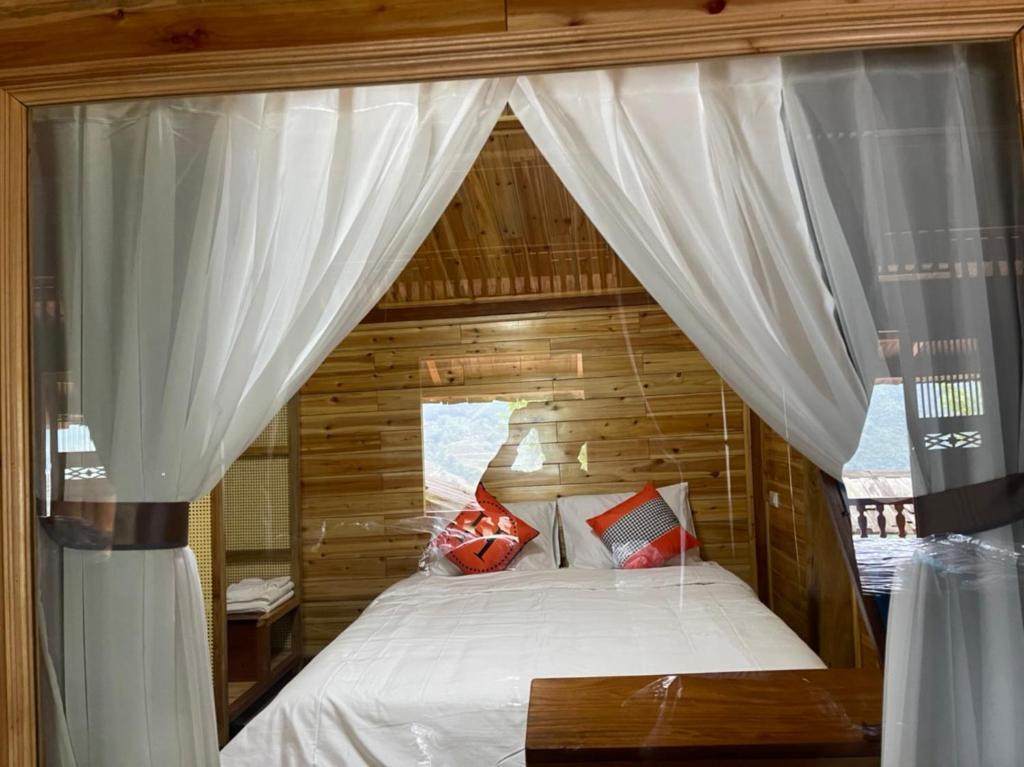 Postel nebo postele na pokoji v ubytování O Châu Homestay Lào Cai
