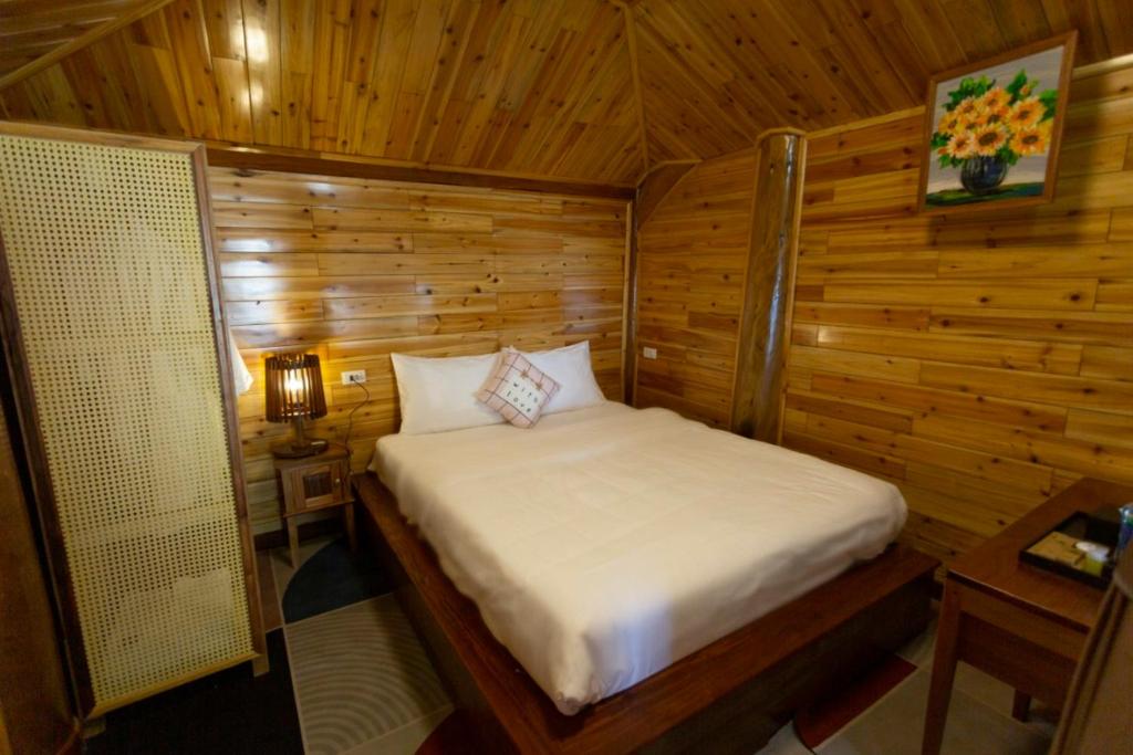 Postel nebo postele na pokoji v ubytování O Châu Homestay Lào Cai