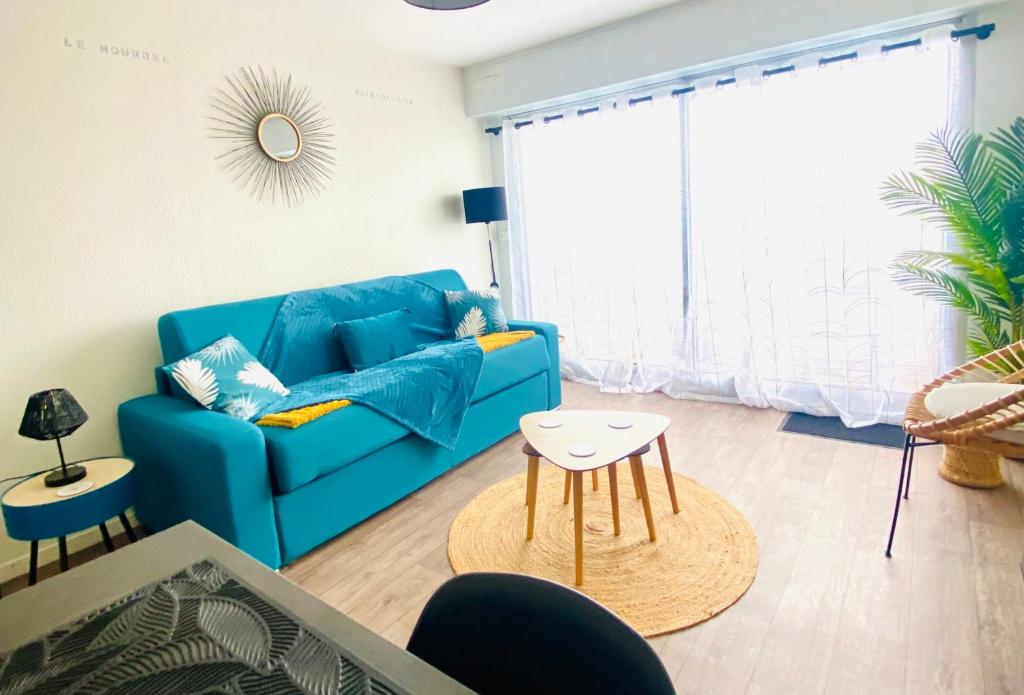 Χώρος καθιστικού στο Studio Entre MER ET DUNES avec balcon vue laterale MER 50m plage pour 3 pers wifi ménage compris