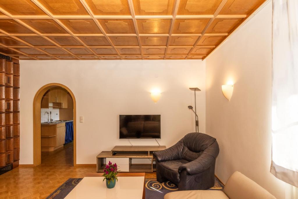 TV a/nebo společenská místnost v ubytování Ferienwohnung Hügelland