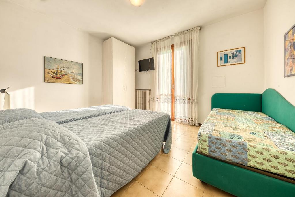 Postel nebo postele na pokoji v ubytování Hotel Residence Charles