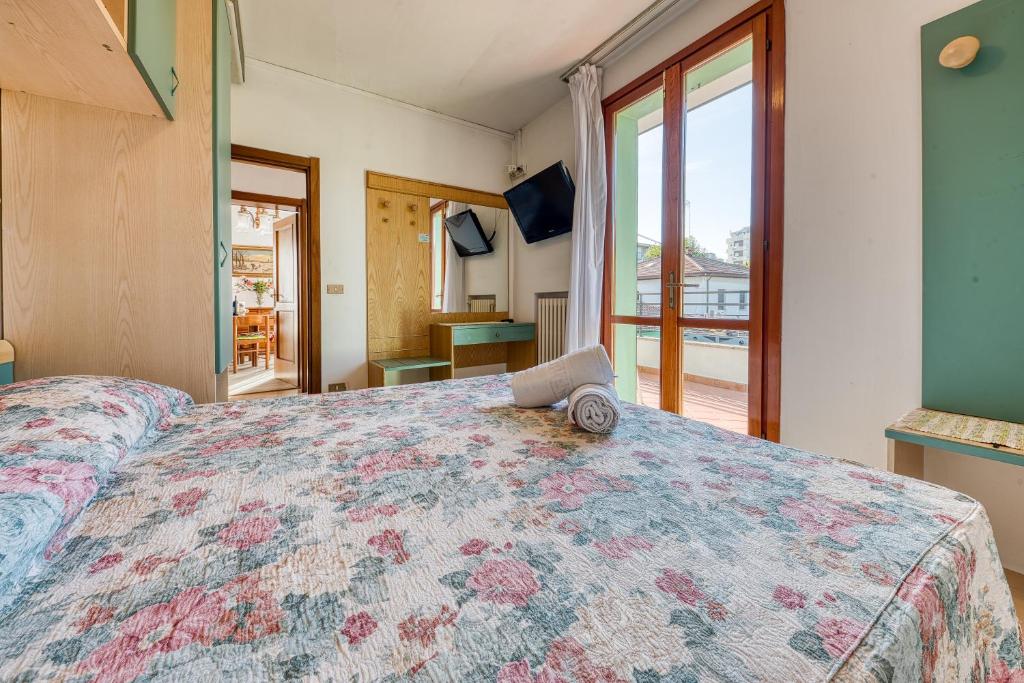 Postel nebo postele na pokoji v ubytování Hotel Residence Charles