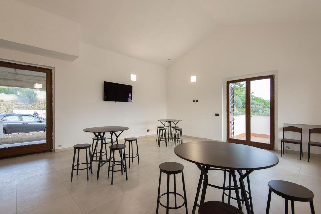 TV a/nebo společenská místnost v ubytování Green Residence Villa Assunta