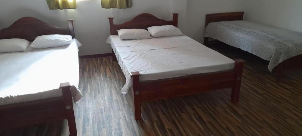 Postel nebo postele na pokoji v ubytování Green Villa
