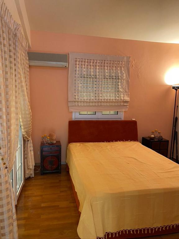 Postel nebo postele na pokoji v ubytování Apartmán se dvěmi ložnicemi