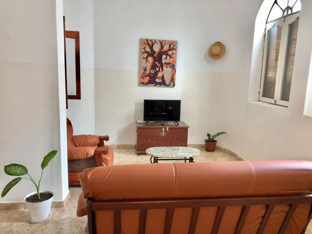 TV a/nebo společenská místnost v ubytování Tarrafal Ecodécor Rooms