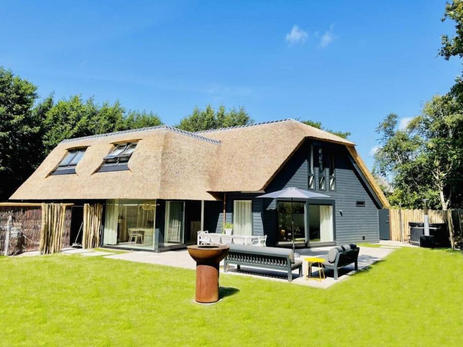 Zahrada ubytování Luxe vakantievilla 'Sieta' op Ameland met wellness