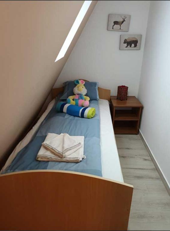 Postel nebo postele na pokoji v ubytování Vila Planinski Mir *Merdzan*