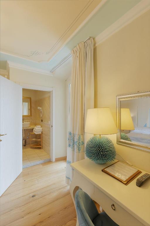 Giường trong phòng chung tại Palazzo Pischedda