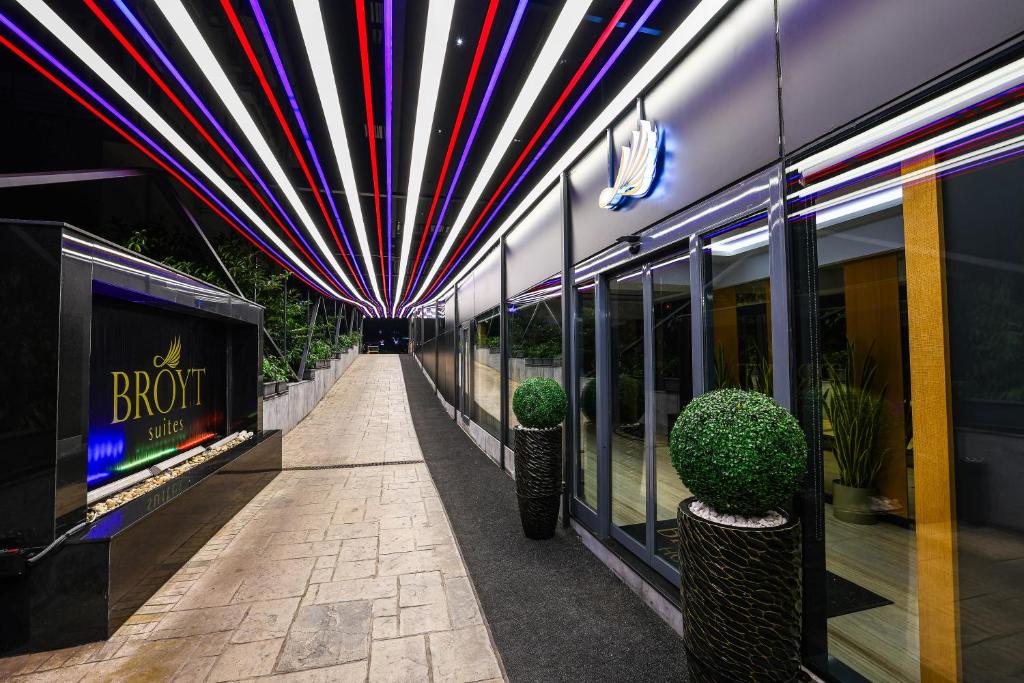 a hallway of a building with a tunnel with plants at Broyt Hotel in Istanbul