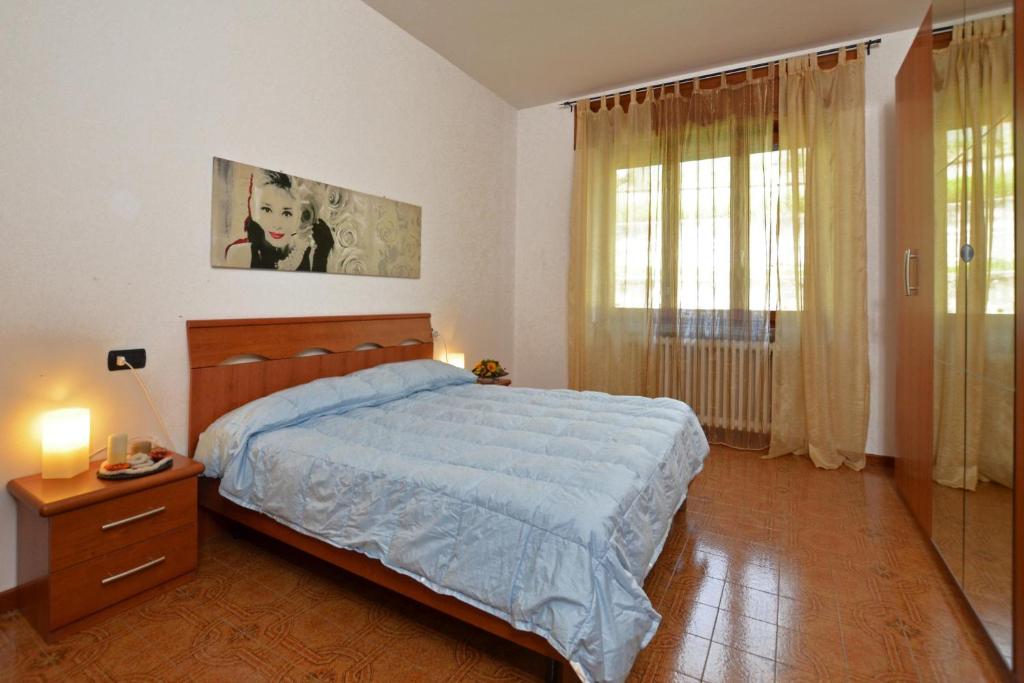 Łóżko lub łóżka w pokoju w obiekcie Casa Virginia