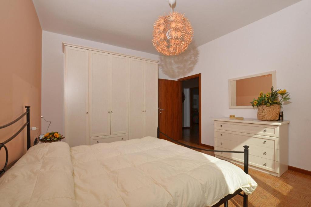 Łóżko lub łóżka w pokoju w obiekcie Casa Virginia