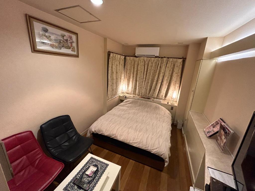 Hotel Sunday Brunch (Adult Only)客房内的一张或多张床位