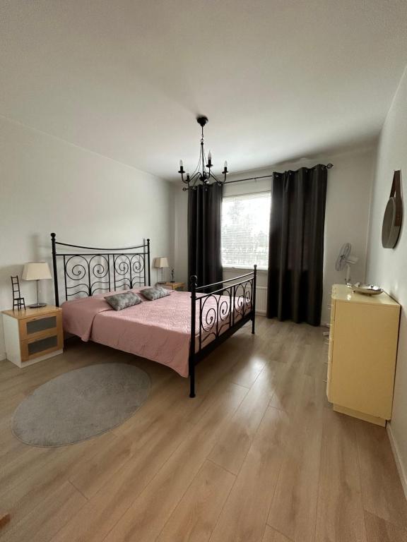 Säng eller sängar i ett rum på Apartments ”Enkeli”