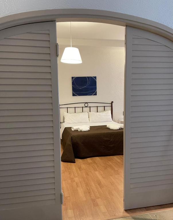 A bed or beds in a room at 100 PASSI Politeama