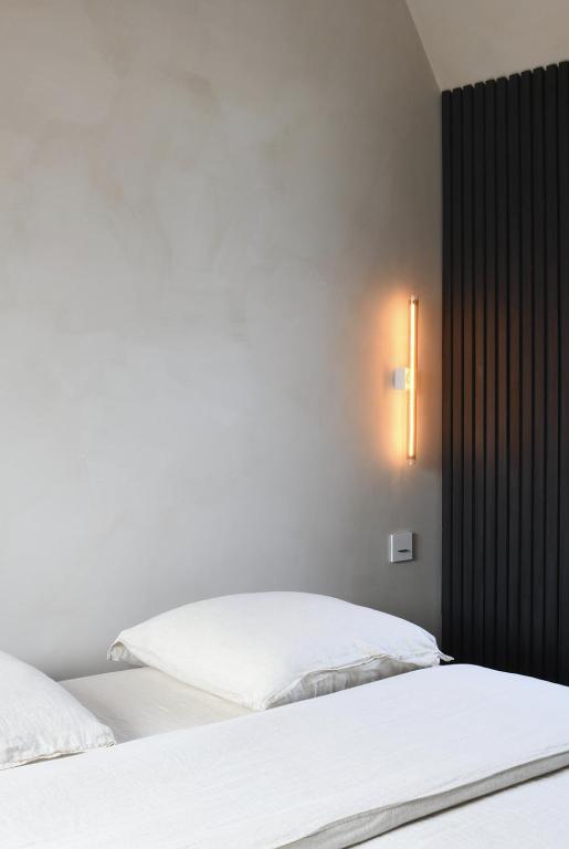 Postel nebo postele na pokoji v ubytování B&B deZwarteFles