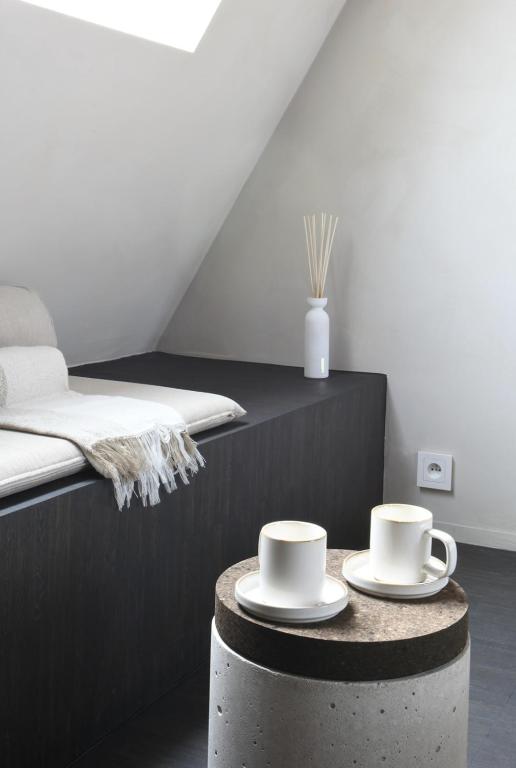 Postel nebo postele na pokoji v ubytování B&B deZwarteFles