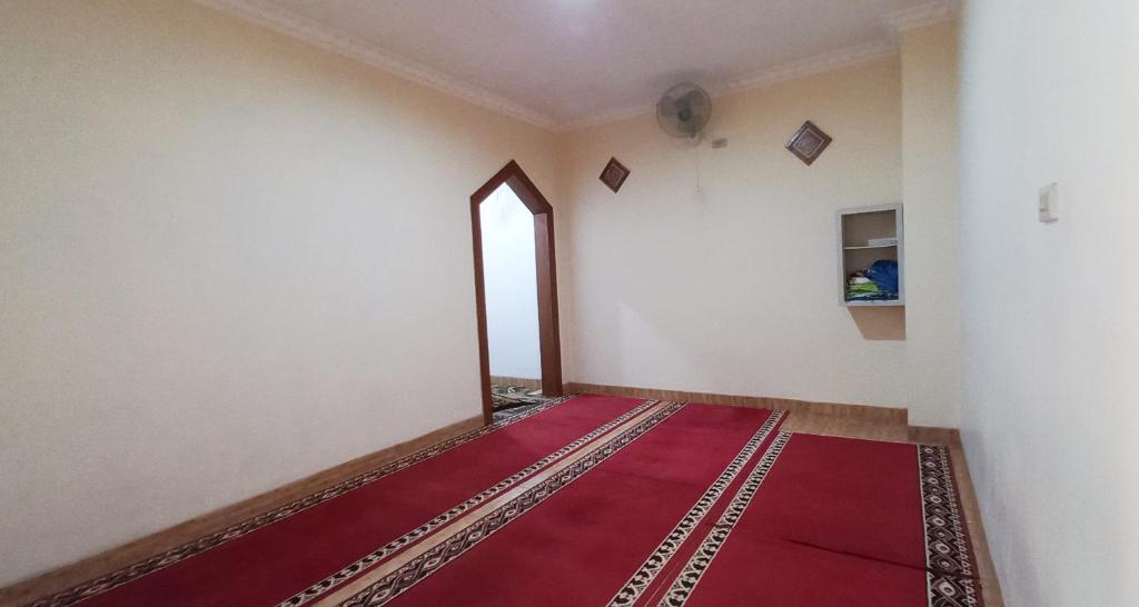 Postel nebo postele na pokoji v ubytování Hotel Syariah GS HERITAGE, Kota Metro