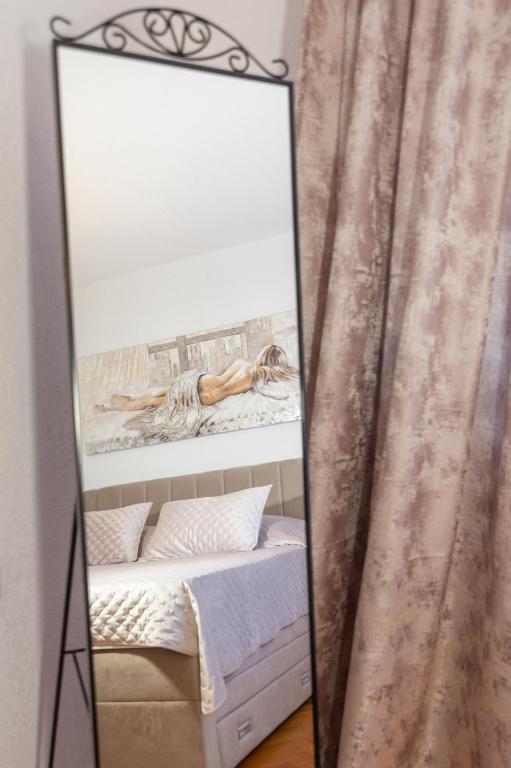 Postel nebo postele na pokoji v ubytování Apartman Dragomir
