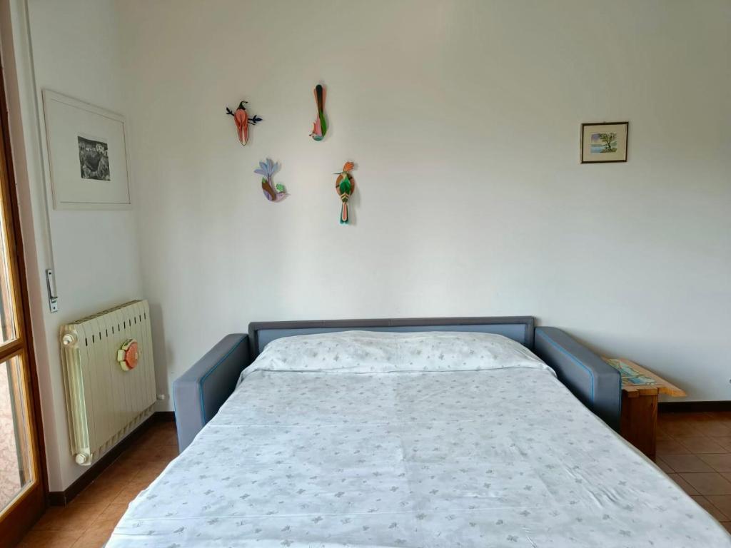 Łóżko lub łóżka w pokoju w obiekcie Casa Lucy