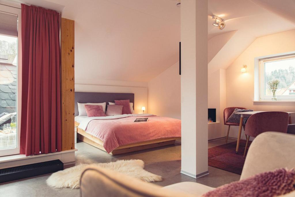 Postel nebo postele na pokoji v ubytování Posthotel Alexander Herrmann