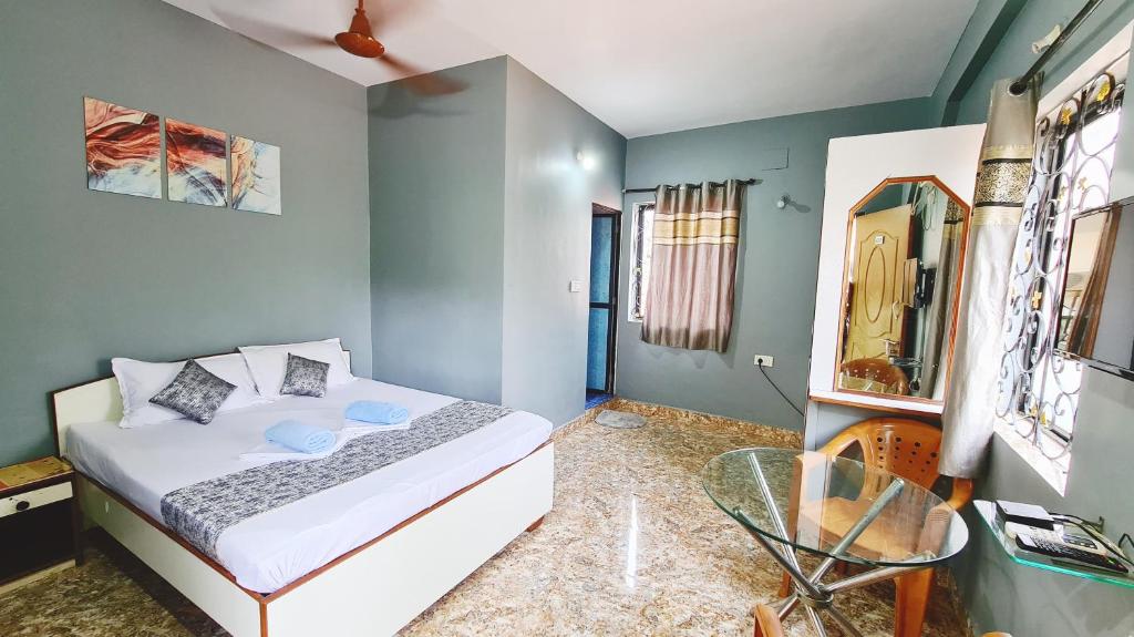 Postel nebo postele na pokoji v ubytování Jackson Beach House Calangute