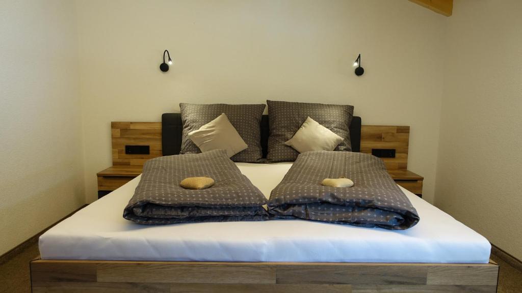 Postel nebo postele na pokoji v ubytování Kaunergrat Appartement