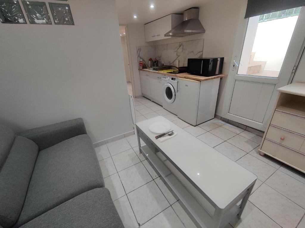 Photo de la galerie de l'établissement Logement 2 pièces avec barbecue 5 minutes gare, à Nanterre