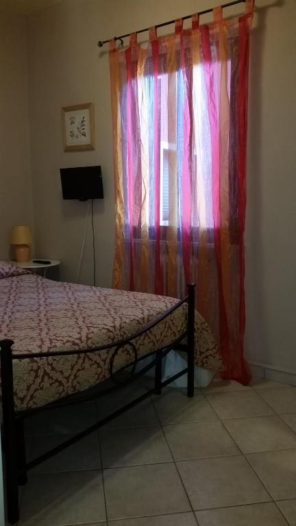 Postel nebo postele na pokoji v ubytování Hotel Monti