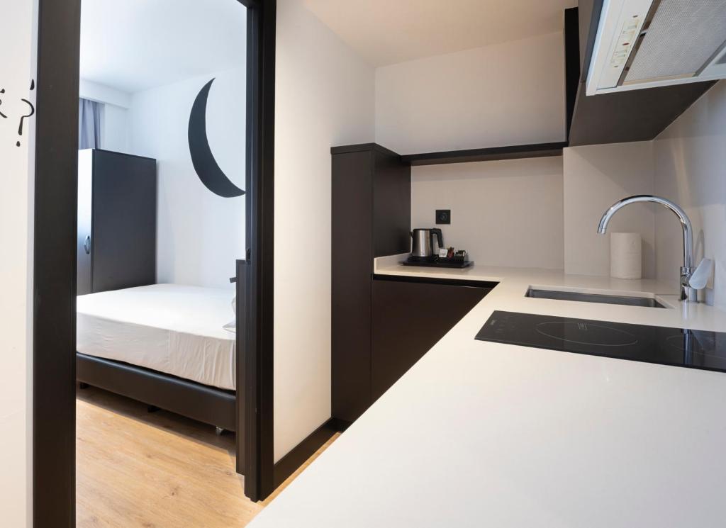Kuchyň nebo kuchyňský kout v ubytování Sercotel Plana Suites