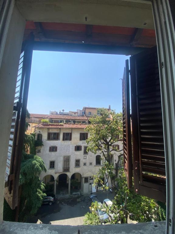 a view of a building from a window at Hotel Dali in Florence