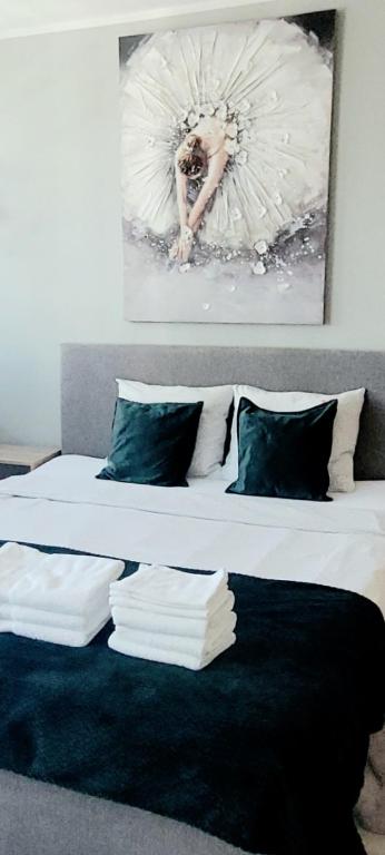 Ліжко або ліжка в номері Apartament Centrum Chmielna