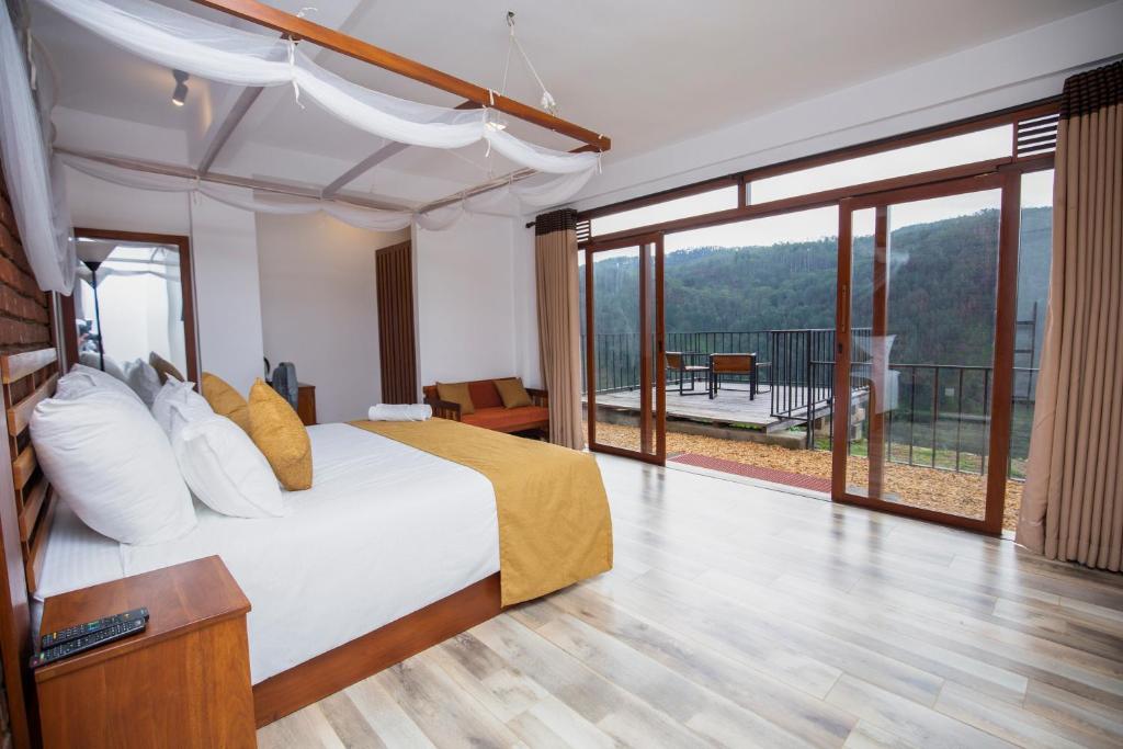 Postel nebo postele na pokoji v ubytování Dowa Elegance Resort