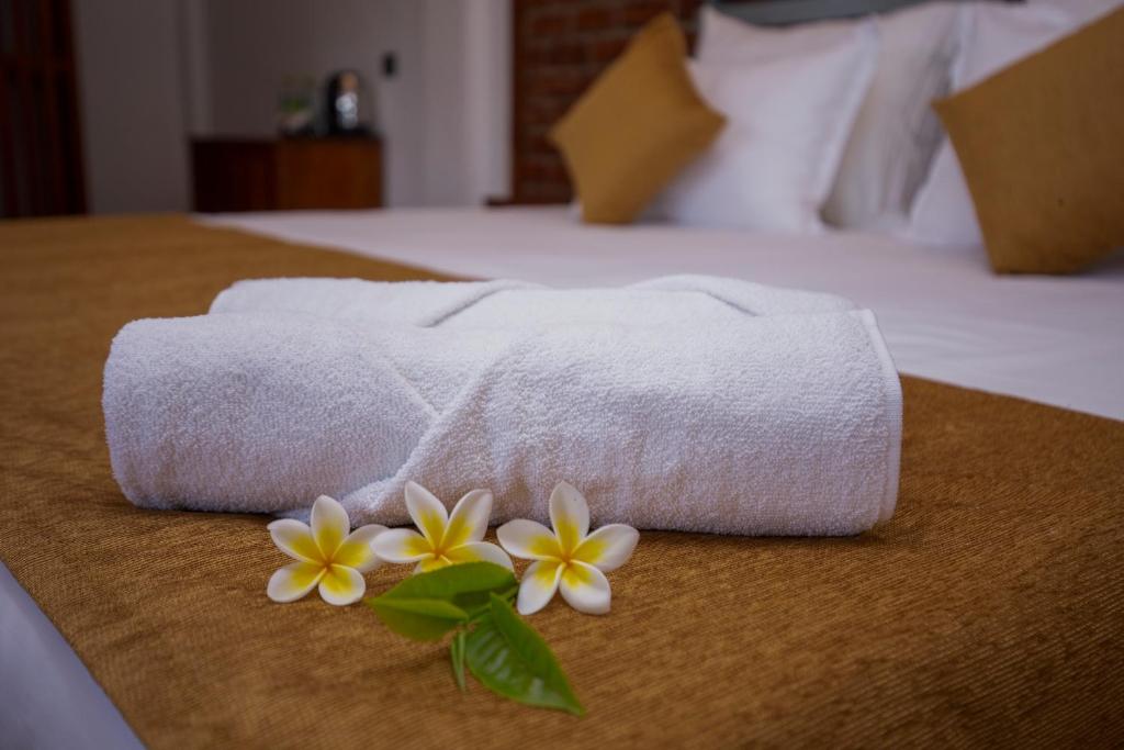 Postel nebo postele na pokoji v ubytování Dowa Elegance Resort