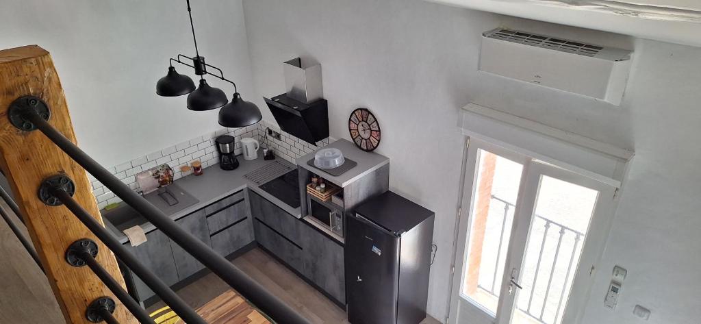 Kuchyň nebo kuchyňský kout v ubytování Loft en duplex au Mas de la Restanque